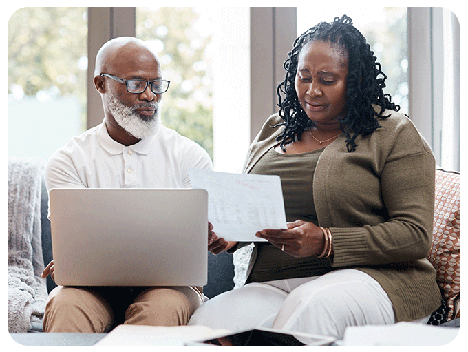 Older couple looking at computer